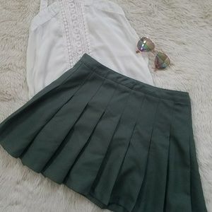 Army green pleated mini skirt